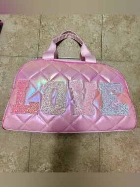 Miss Gwen’s omg accessories duffel bag